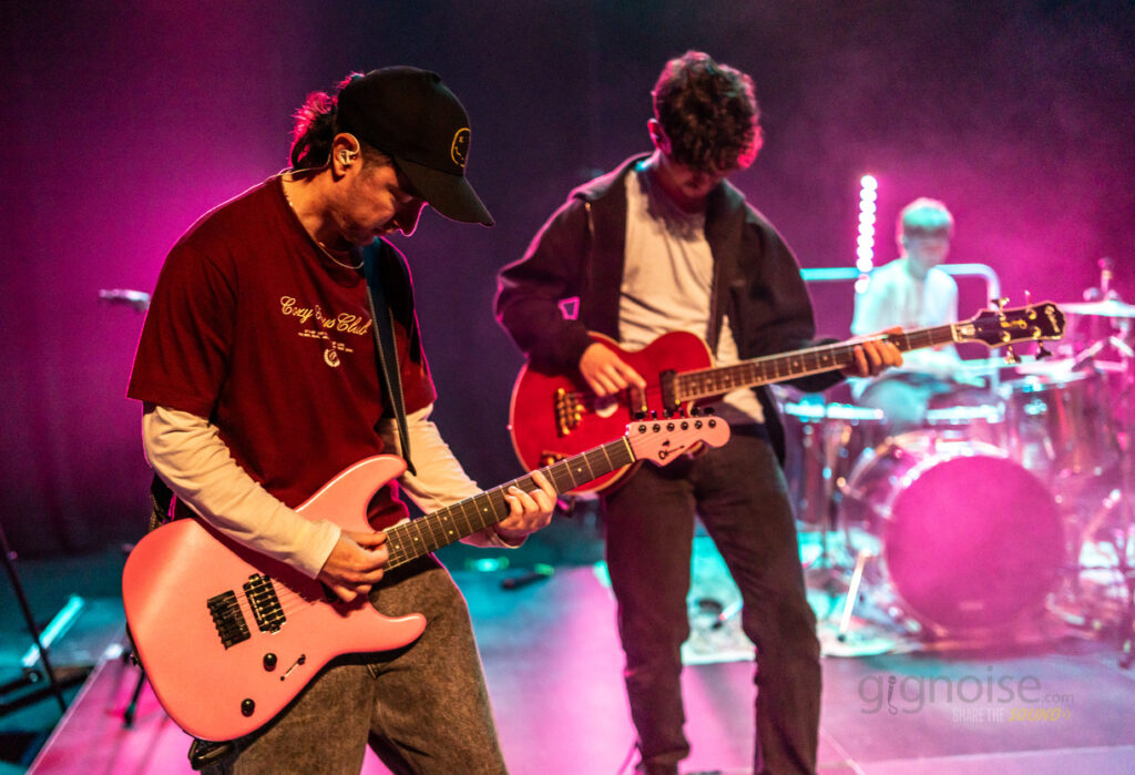 Charcoal Greys Guitar Player