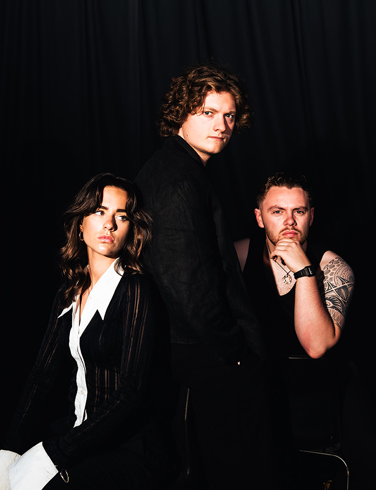 Seb Lowe with band members Kate Couriel and Joel Goodwin 